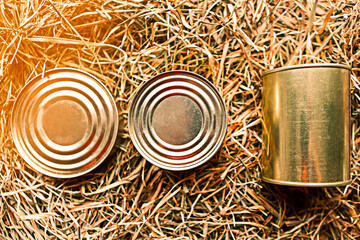 canned meat packs as a quarantine stock on dry sraw background