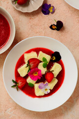 Curd Lazy dumplings with strawberry sauce.top veiw.style hugge