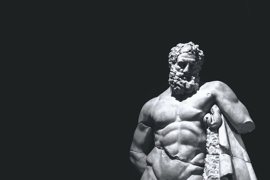 Hercules marble statue in dramatic lighting, monochrome, black background. Aug 18, 2022. Antalya Museum, Turkey (Turkiye)