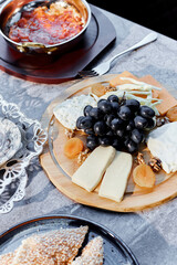 Turkish soup with tomatoes and assorted cheese combined with juicy grapes and dried fruits. A delicious gourmet dish, perfect for sophisticated gourmets.