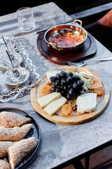 Turkish soup with tomatoes and assorted cheese combined with juicy grapes and dried fruits. A delicious gourmet dish, perfect for sophisticated gourmets.