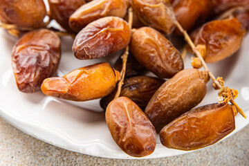 date branch dried sweet fruit fresh meal food snack on the table copy space food background rustic top view