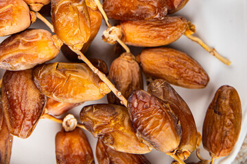 date branch dried sweet fruit fresh meal food snack on the table copy space food background rustic top view