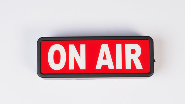 On air neon sign on black background..