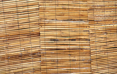 Dry bamboo fence as an abstract background. Texture