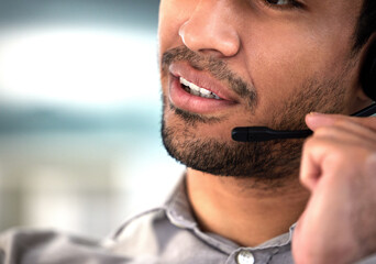 Call center, man and mic with communication in office for customer service, telemarketing or...