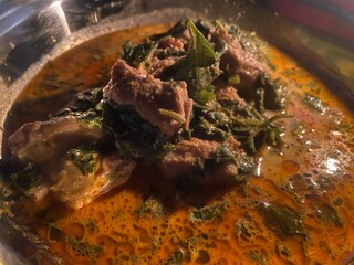 Southern Thai Pork Curry with Wild Betel Leaves. Savor the robust flavors of Southern Thai Pork...