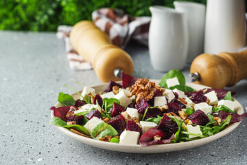 delicious fresh beet salad on a light stone background