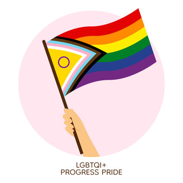 Hand holding rainbow progressive pride flag