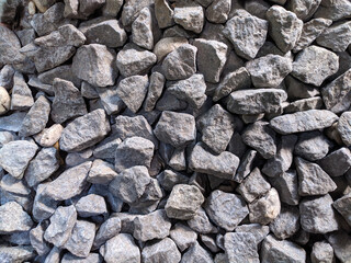 gray crushed rock construction gravel background and texture,used for architecture,structures and buildings