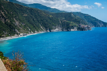 Fototapeta na wymiar Magic of the Cinque Terre. Colors of the houses and the sea of ​​Corniglia