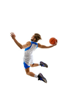 Back view dynamic image of young man, basketball player in motion with ball, scoring goal. practicing isolated on white background. Concept of sport, competition, active and healthy lifestyle, game