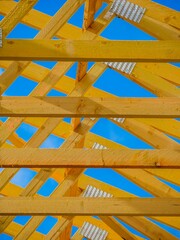 Industrial Wooden Framework with Blue Sky