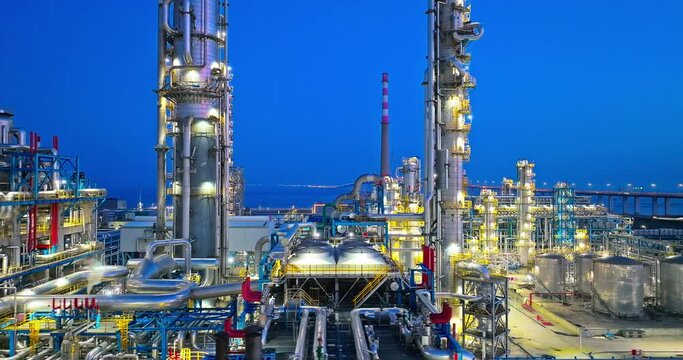 Aerial view of refinery chemical plant in industrial area at night