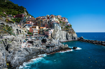 Fototapeta na wymiar Magic of the Cinque Terre. Timeless images. Manarola, a dream village overlooking the sea