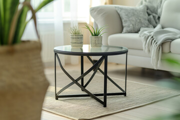 Sleek, minimalist side table with a geometric metal frame in a stylish living space