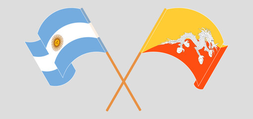 Crossed and waving flags of Argentina and Bhutan