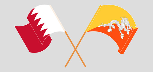 Crossed and waving flags of Bahrain and Bhutan