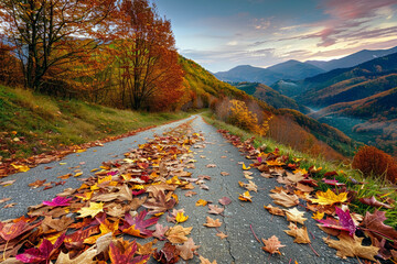 Exquisite Serenity and Vibrant Colors of Autumn with This Diagonal View of a Path Covered in Colorful Fallen Leaves Against Mountainous Backdrop