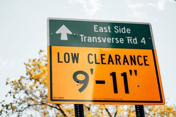 Low Clearance sign on the side of the road in Manhattan - New York City. 