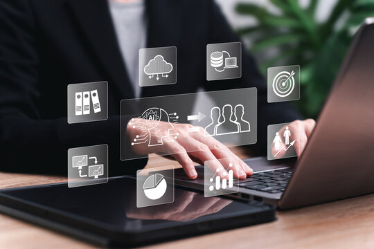 AI Artificial intelligence and humans, Business management concept, Businesswomen use laptops to automate technology generate and learn to develop business work, Transfer data, Target Marketing