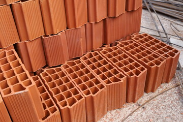 Roof bricks. Thermal ceramic brick. Bricks for construction of houses and buildings. Concept of...