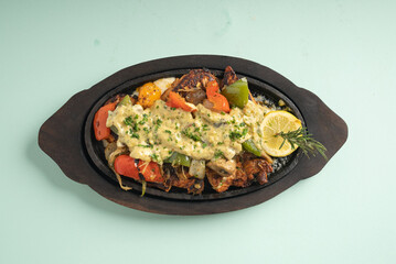 Chicken sizzler with Honey glazed chicken, mixed veg, cream cheese, cheese and mushroom sauce