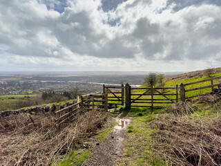 Gate or wooden fence with dirt foot path, track leading to the Scottish highlands, Kilpatrick...