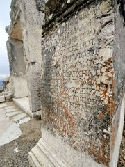 Ancient inscription on a stone in the ancient Greek or Roman city of Cibyra in Burdur, Turkey. 