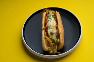 Fajita roll sandwich with Pepper, onion, mushroom, fajita spice, bbq and cheese with pesto mayo