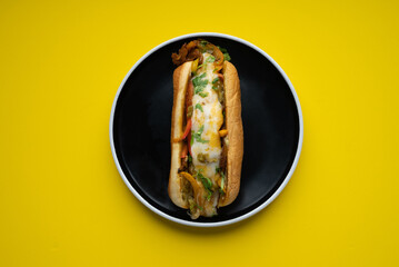 Fajita roll sandwich with Pepper, onion, mushroom, fajita spice, bbq and cheese with pesto mayo