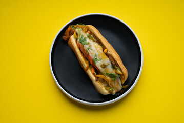 Fajita roll sandwich with Pepper, onion, mushroom, fajita spice, bbq and cheese with pesto mayo