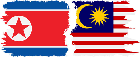 Malaysia and North Korea grunge flags connection vector