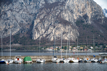 Driving car along shores of Lake Como in Northern Italy, spring sunny days, views of alpine...