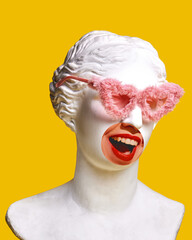 Antique statue bust in fluffy pink sunglasses and female mouth photo element in yellow background. Party vibe. Modern design. Contemporary colorful art collage. Concept of creative vision, emotions.