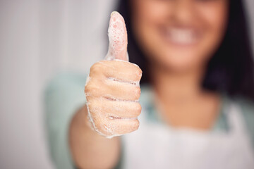 Woman, thumbs up and promotion for washing hands in home, foam and agreement on soap. Female...