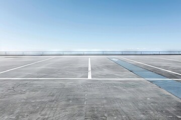 empty concrete car park floor with clear sky