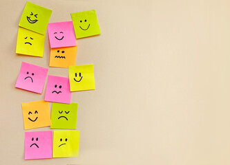 Many sticky notes with different sad and happy emotions  . Survey Concept  