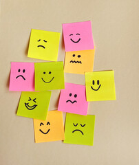 Many sticky notes with different sad and happy emotions  . Survey Concept  