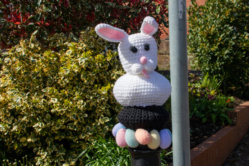 knitted rabbit with eggs bollard topper in Titchfield Hampshire England for easter celebrations