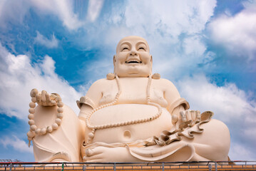 Giant Buddha statue in Vietnam with blue sky - 794058711