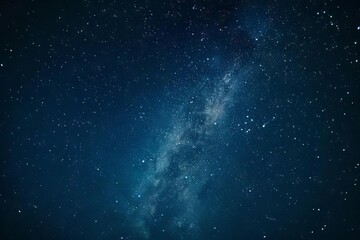 majestic milky way galaxy and twinkling stars in deep blue night sky long exposure astrophotography - obrazy, fototapety, plakaty
