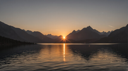 Fototapeta premium Mountain Sunset Silhouette: Dramatic Reflections on Lake's Surface