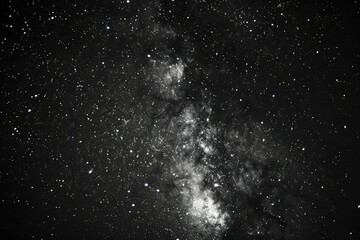 a black and white photo of a star cluster - obrazy, fototapety, plakaty