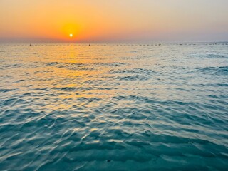 Orange sea sunset, orange sea horizon, sunshine, evening warm light