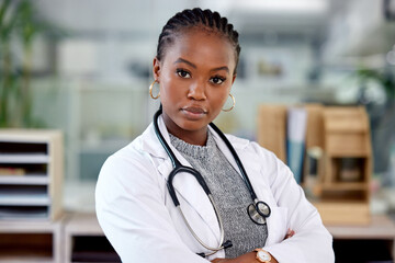 Portrait, black woman and arms crossed with doctor in office, confidence and integrity with...
