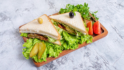 Club sandwich sliced on tray