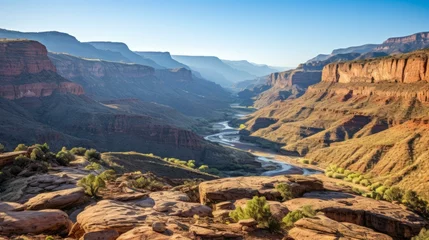 Foto op Aluminium b'Arid desert canyon landscape with a winding river below' © Adobe Contributor