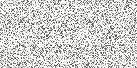 Black doodles on white background. Seamless repeated pattern background.