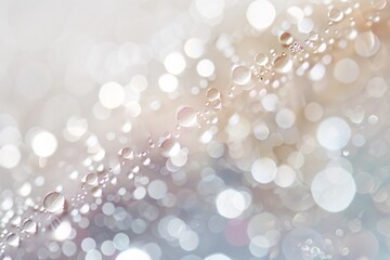 Abstract background. Abstract background of glistening water droplets on a soft luminous, bokeh surface.